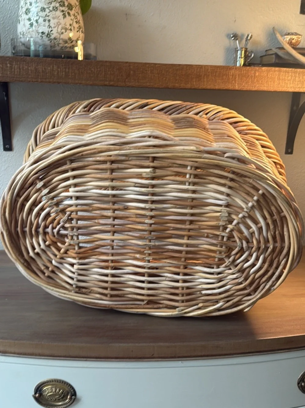 Woven Wicker Basket with Pink Crochet Throw